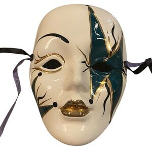 vintage venetian ceramic  mask teal black and gold court jester design .